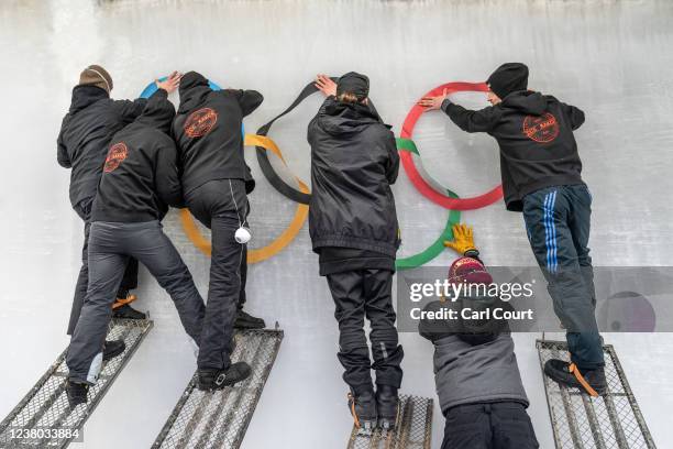 Ice makers install sub-glacial Olympic Rings at the sliding track at Yanqing Olympic Zone on January 28, 2022 in Yanqing, China. With just one week...