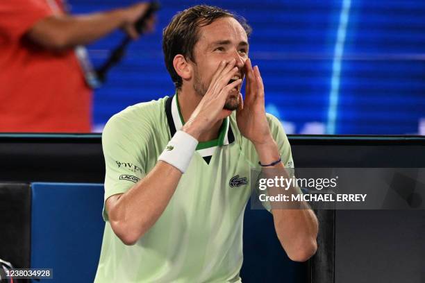 Russia's Daniil Medvedev argues with the umpire during his men's singles semi-final match against Greece's Stefanos Tsitsipas on day twelve of the...