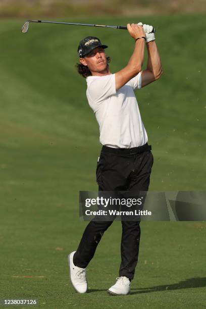 Kristoffer Broberg of Sweden hits his second shot on the 14th hole during day two of the Slync.io Dubai Desert Classic at Emirates Golf Club on...