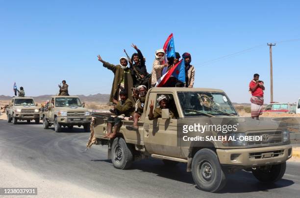 Yemeni pro-government fighters from the UAE-trained Giants Brigade, gather on the outskirts of Ataq city, east of the Red Sea port of Aden, on their...