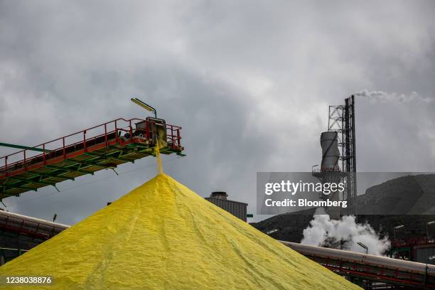 Sulphur falls from a conveyor belt at Repsol SA's Cartagena oil refining complex in Cartagena, Spain, on Thursday, Jan. 27, 2022. Oil is headed for a...