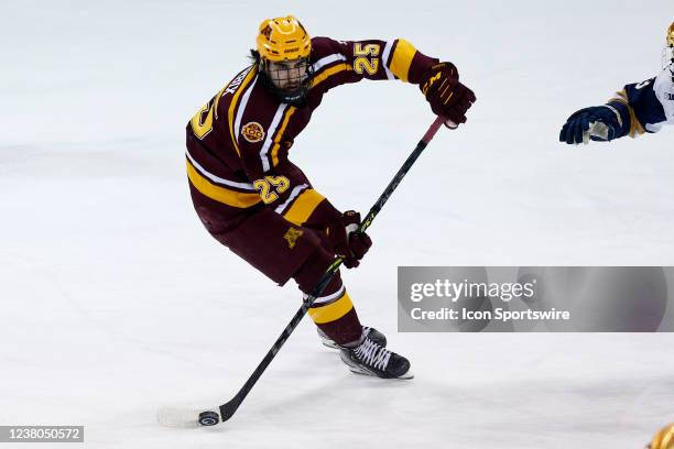 Minnesota forward Jack Perbix looks to make a pass during a mens college hockey game between the Minnesota Golden Gophers and the Notre Dame Fighting...