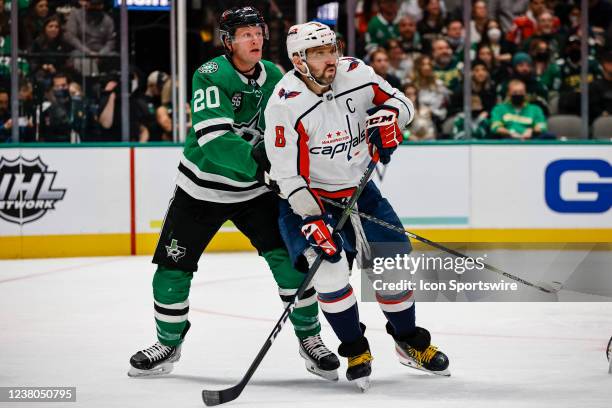 Dallas Stars defenseman Ryan Suter and Washington Capitals left wing Alex Ovechkin battle for position during the game between the Dallas Stars and...
