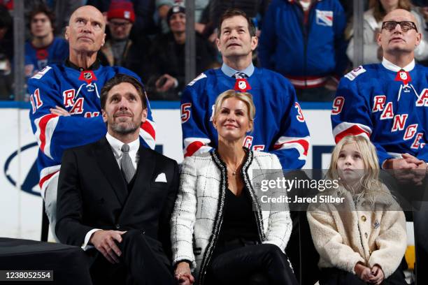 Former New York Rangers goaltender Henrik Lundqvist and wife Therese Andersson look on during his jersey retirement night prior to the game against...