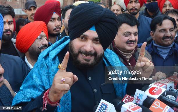 Punjab Pradesh Congress Committee President Navjot Singh Sidhu addresses the media after filing his nomination papers for Punjab Assembly elections,...