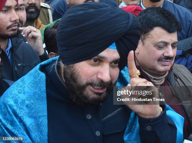 Punjab Pradesh Congress Committee President Navjot Singh Sidhu addresses the media after filing his nomination papers for Punjab Assembly elections,...