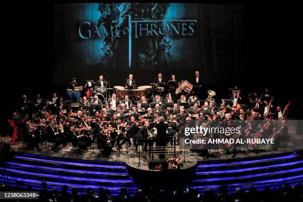 Instrumentalists from the Iraqi Symphony Orchestra perform musical pieces from the HBO television series "Game of Thrones" at a concert during the...