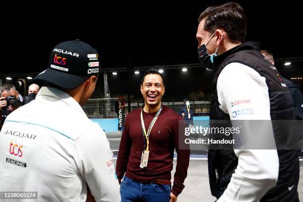 In this handout provided by Jaguar Racing, James Barclay, Team Director, Jaguar TCS Racing, and Mitch Evans of New Zealand, Jaguar TCS Racing, meet...