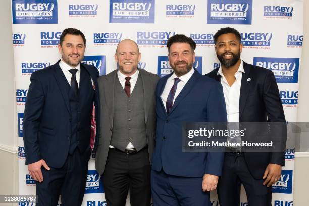 Thinus Delport, Mike Tindall, Nick Knowles and Delon Armitage pose for a photograph ahead of the Rugby for Heroes 10th anniversary dinner at the...