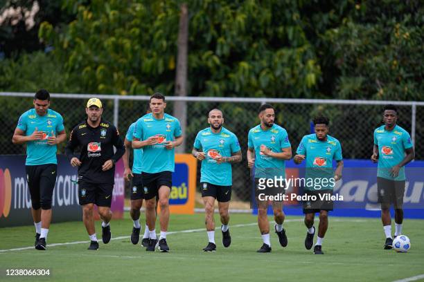 Dani Alves of Brazil and teammates run during a training session at Toca da Raposa II on January 29, 2022 in Belo Horizonte, Brazil. Brazil faces...
