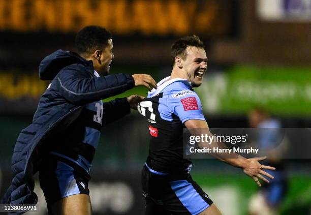 Cardiff , United Kingdom - 29 January 2022; Jarrod Evans of Cardiff, right, celebrates with teammate Ben Thomas, left, after kicking the winning...