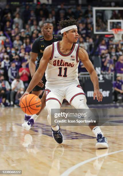 Illinois Fighting Illini guard Alfonso Plummer dribbles the ball in action during a college basketball game between the Illinois Fighting Illini and...