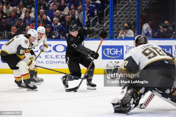 Brayden Point of the Tampa Bay Lightning shoots against Mark Stone and goalie Robin Lehner of the Vegas Golden Knights during the third period at...