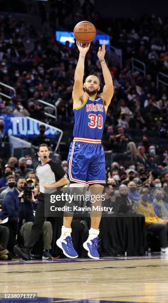 Stephen Curry of the Golden State Warriors takes a jump shot in the second half against the Brooklyn Nets at Chase Center on January 29, 2022 in San...