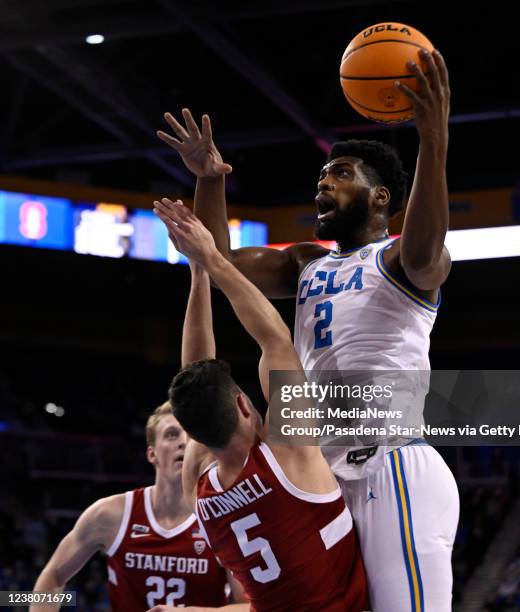 Los Angeles, CA Cody Riley of the UCLA Bruins drives to the basket against Michael O'Connell of the Stanford Cardinal in the first half of a NCAA...