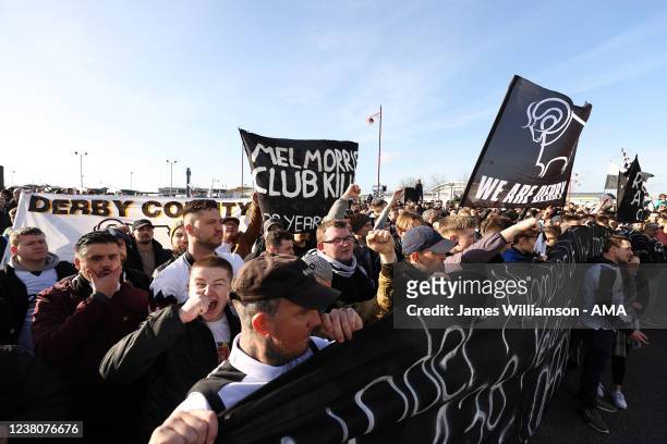 Derby County fans protest against chairman Mel Morris before the Sky Bet Championship match between Derby County and Birmingham City at Pride Park...