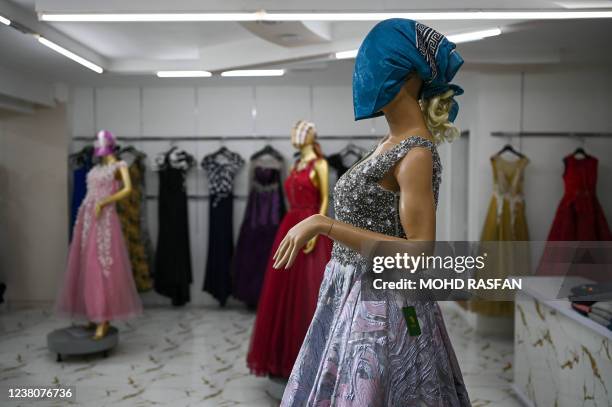 Mannequins with their heads covered are pictured at a mall in Kabul on January 30, 2022.