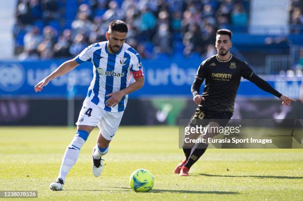 Luis García del Pozo Recio of Leganés looks to pass the ball during the La Liga Smartbank match between CD Leganes and AD Alcorcon at Estadio...