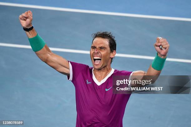 Spain's Rafael Nadal reacts after winning against Russia's Daniil Medvedev during their men's singles final match on day fourteen of the Australian...