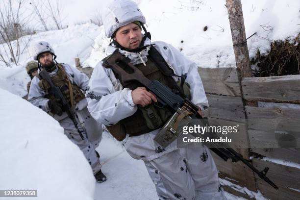 Ukrainian servicemen seen along the frontline outside of Svitlodarsk, Ukraine on January 30, 2022.