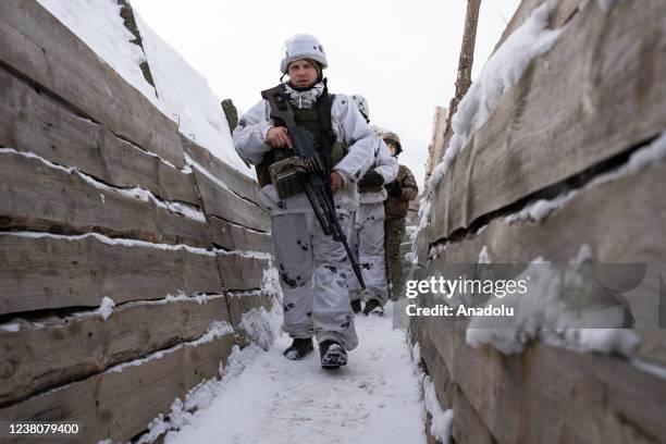 Ukrainian servicemen seen along the frontline outside of Svitlodarsk, Ukraine on January 30, 2022.