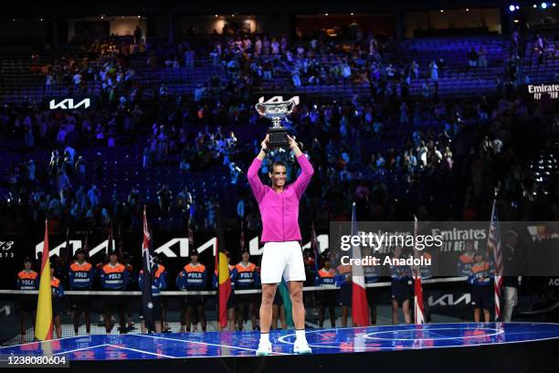 Spainâs Rafael Nadal celebrates with the trophy after the menâs singles final against Russiaâs Daniil Medvedev at the Australian Open grand slam...