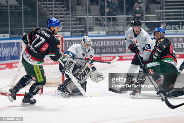 Colin Campbell of Augsburger Panthers, goalkeeper Niklas Treutle of Nuernberg Ice Tigers, Marcus Weber of Nuernberg Ice Tigers and Adam Payerl of...