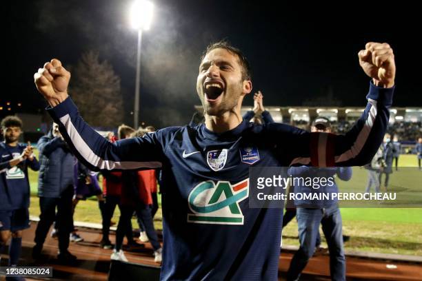 Bergerac's French midfielder Damien Fachan celebrates after the victory of Bergerac over Saint-Etienne in the round of 16 French Cup football match...