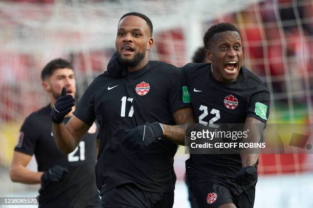 Canadas Cyle Larin , celebrates his first half goal with Richie Lareya during the World Cup qualifying match between Canada and the United States in...