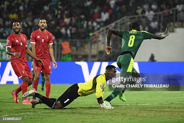 Senegal's midfielder Cheikhou Kouyate celebrates after scoring his team's second goal during the Africa Cup of Nations 2021 quarter-final football...