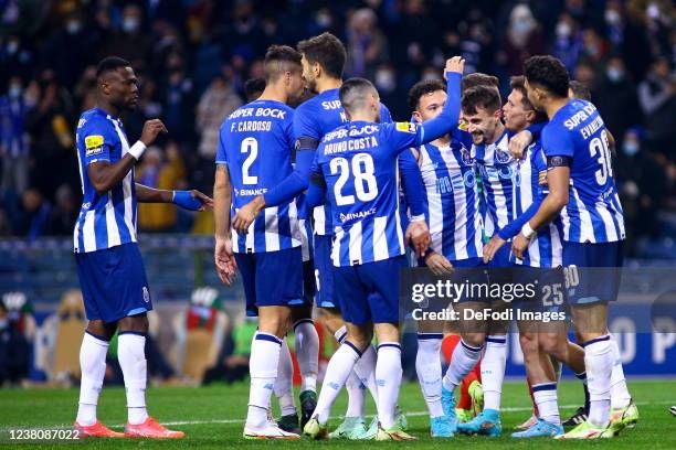 Eduardo Aquino of FC Porto celebrates after scoring his team's second goal with teammates during the Liga Portugal Bwin match between FC Porto and CS...