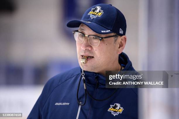 In this picture taken on January 24 Canadian coach and former international Jim Paek -- the first Korea-born NHL player to win the Stanley Cup -- who...