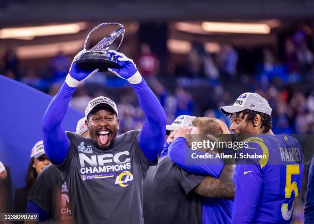 Los Angeles, CA Rams line backer Von Miller hoists the NFC Championship trophy after the Rams 20-17 victory over the San Francisco 49ers in the NFC...