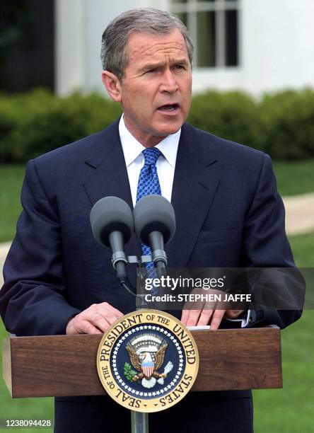 President George W. Bush briefs the press on the status of the downed plane in China, outside the Oval Office in Washington, DC, 02 April 2001. Bush...