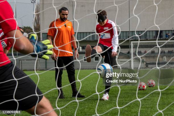 Players of the Portugal national football team for the blind perform training at the Porto Pinheiro sports complex, Lisbon. 30 January 2022. The...