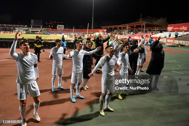 Iulian Cristea, Ianis Stoica, Darius Olaru, Risto Rdaunovic, Andrei Miron, Razvan Oaida and Florinel Coman celebrate with the fans during the Romania...