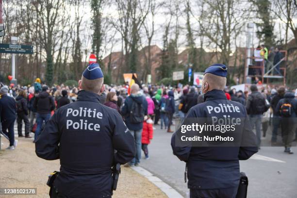 Police officer overview the protest. Protest against the government and COVID measures in the Belgian capital, Brussels. The protesters marched...