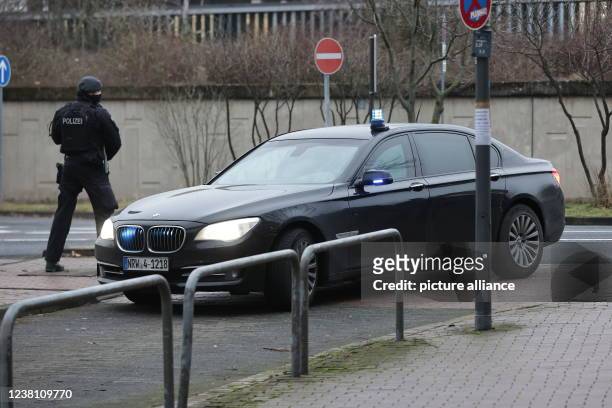 February 2022, North Rhine-Westphalia, Cologne: Several cars arrive at the regional court for the start of the trial of former Reemtsma kidnapper Th....