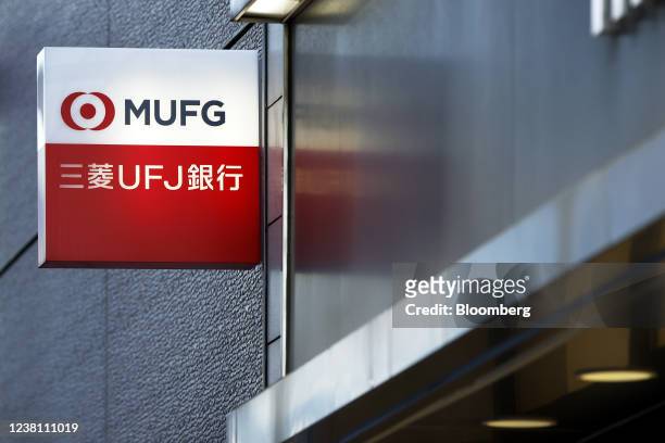 Signage for MUFG Bank Ltd., a unit of Mitsubishi UFJ Financial Group Inc. , displayed outside a branch in Tokyo, Japan, on Monday, Jan. 31, 2022....