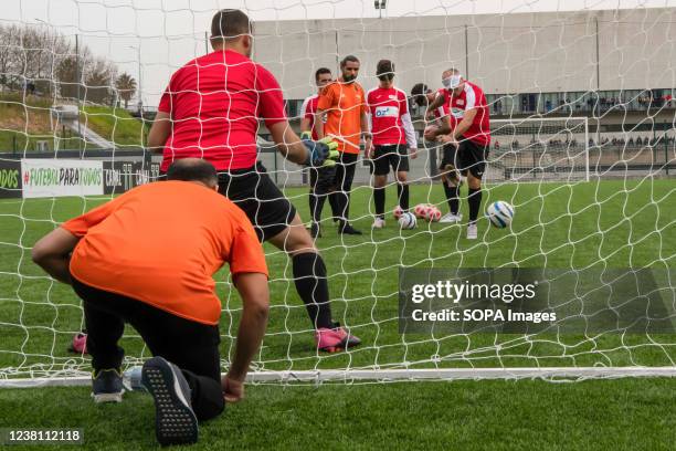 Players of the national soccer team for the blind are training at the Porto Pinheiro sports field in Lisbon. The first phase of the blind soccer...