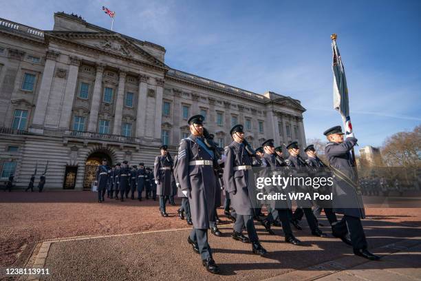 Troops march away at the conclusion of the Changing of the Guard ceremony, which is commemorating the 80th anniversary of the formation of the Royal...