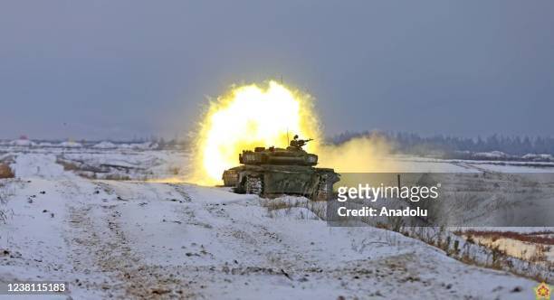 Belarusian tank fires as units complete their last preparations ahead of the joint military exercise called "Allied Determination-2022" with Russia,...