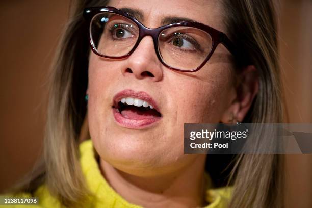 Senator Kyrsten Sinema , speaks during a Senate Homeland Security and Governmental Affairs Committee confirmation hearing for Shalanda Young,...