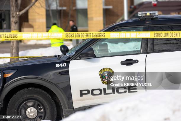 Police vehicle sits in front of South Education Center Academy in Richfield, Minnesota, on February 1, 2022. - Two campus police officers were shot...