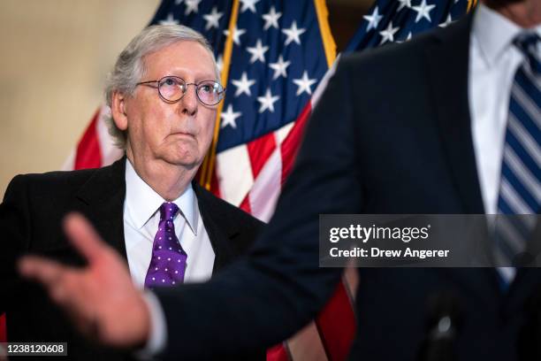 Senate Minority Leader Mitch McConnell attends a news conference after a lunch meeting with Senate Republicans on Capitol Hill February 1, 2022 in...