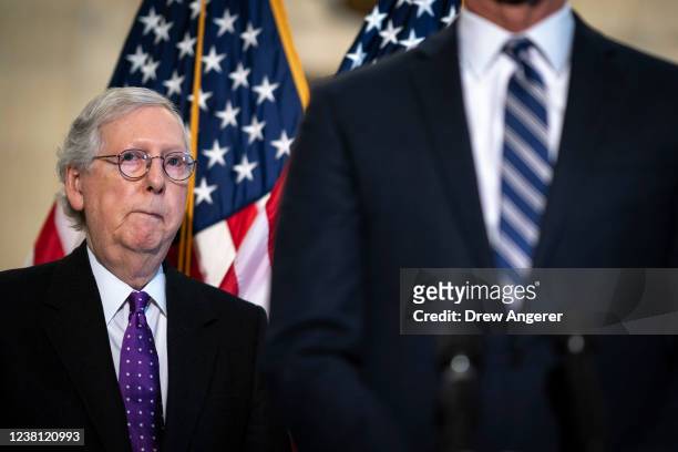 Senate Minority Leader Mitch McConnell attends a news conference after a lunch meeting with Senate Republicans on Capitol Hill February 1, 2022 in...