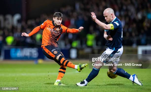 Dundee Utd's Dylan Levitt has a shot under pressure from Charlie Adam during a cinch Premiership match between Dundee and Dundee United the Kilmac...