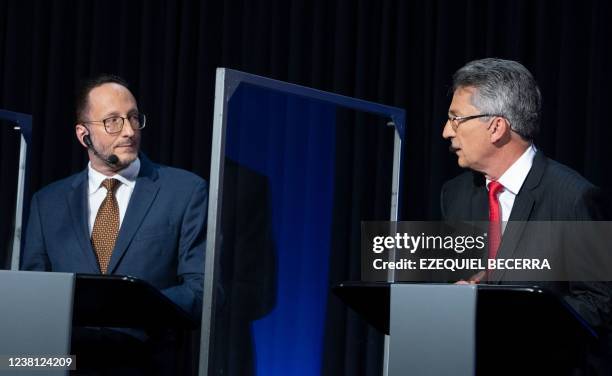 Costa Rican presidential candidates Eliecer Feinzaig of the Progressive Liberal Party, and Welmer Ramos of Acción Ciudadana party, participate in a...