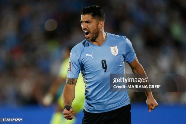 Uruguay's Luis Suarez celebrates after scoring against Venezuela during the South American qualification football match for the FIFA World Cup Qatar...