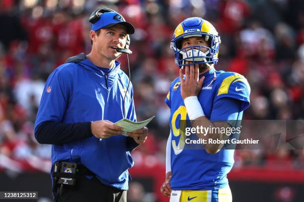 Tampa, Florida, Sunday, January 23, 2022 - Rams coach Zac Robinson talks with quarterback Mattew Stafford during a break in the action against the...